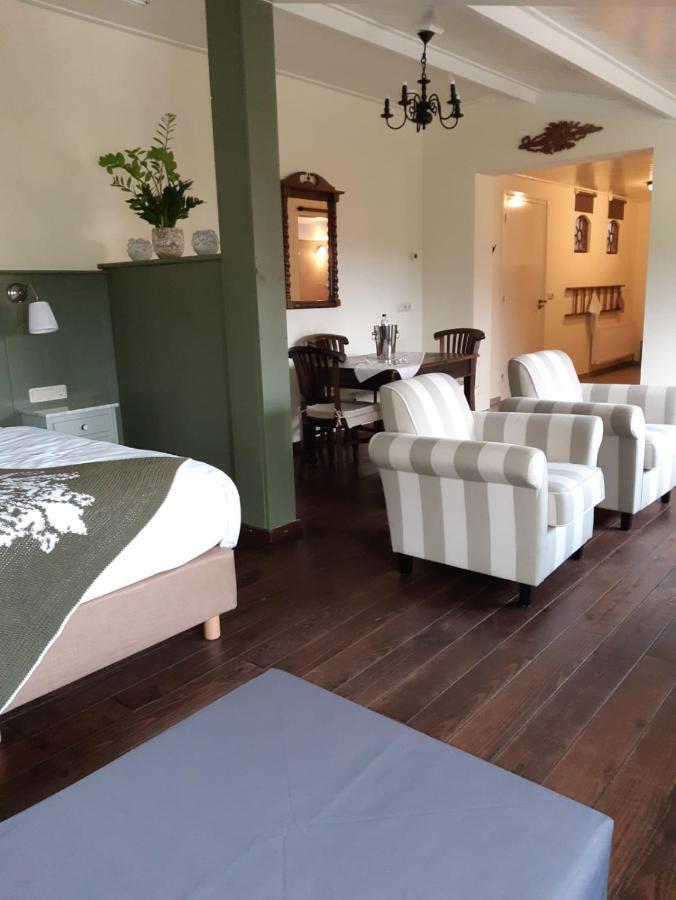 De Turfstaeker Acomodação com café da manhã Ospel Exterior foto