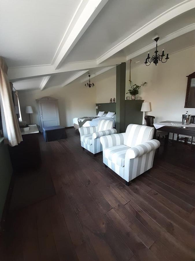 De Turfstaeker Acomodação com café da manhã Ospel Exterior foto